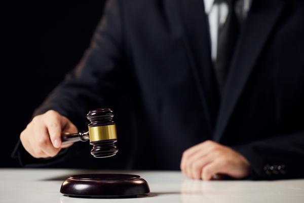 区分生效法律文书确定的义务：拒绝履行与不
